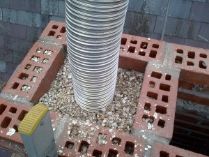 Chimney lined with Vemeculite Insulation