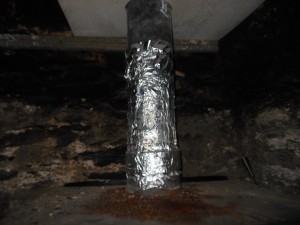 This customer toldme that his chimney was "insulated". He put this around the flue to stop the tar dripping onto the stove ! Needless to say I advised him to stop using the appliance and chimney.