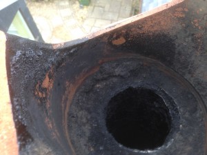 Broken Chimney pot and tarred up liner allowing rain to enter and mix with soot causing corrosion