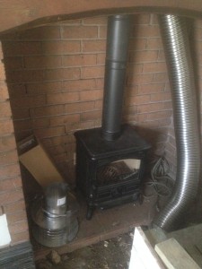 Stove placed and liner down the chimney.