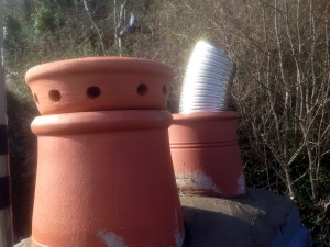 The Liner has now been installed after some tests.The disused bedroom chimney is capped with a teracotta fluevent to allow the chimney to breathe but also keep the birds from getting in and blocking it