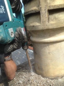 The old pot had to be removed carefully before lining the chimney. This was because it was loose and sitting on rusted bars.